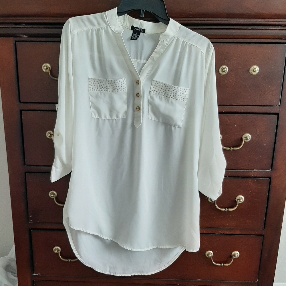 Cream colored blouse with gold detail